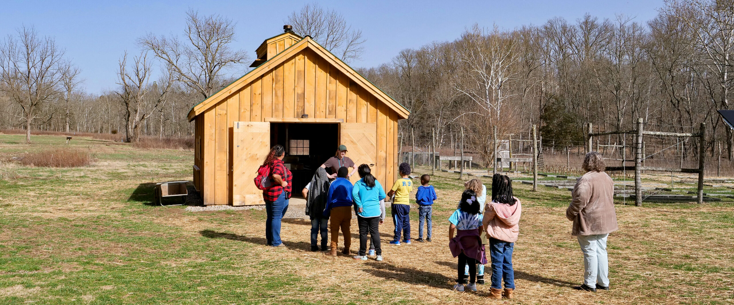 Students on a Greenacres field trip learning about maple syrup